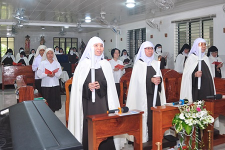 Three Carmelite nuns in Burgos, Philippines make their profession on October 1, 2022